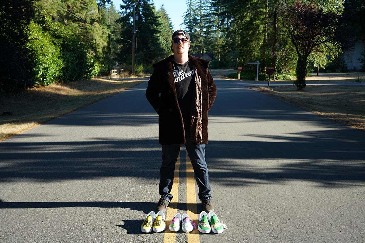 Standing in the street with shoes.